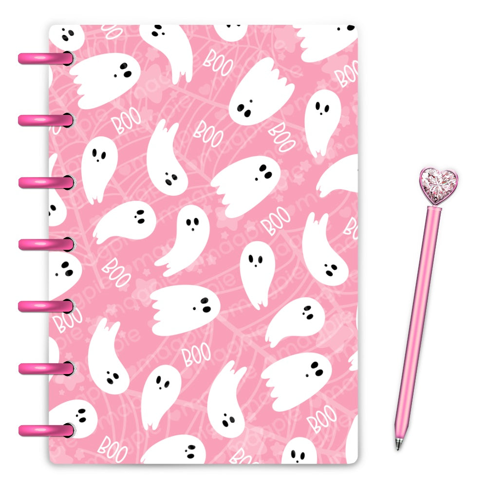 White ghosts scattered on pink spider webbed background laminated planner cover for halloween