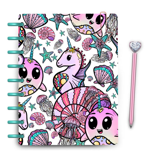 Seahorse with seashells and narwhal drawings with pink and blue ombré bright colors on a laminated planner cover 