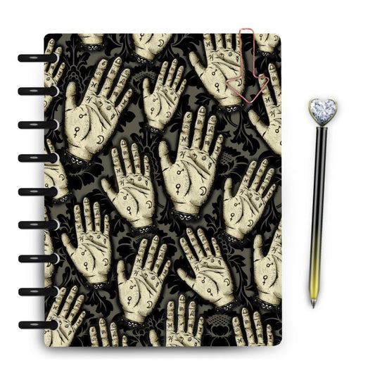 Palmistry hand drawings scattered across damask background laminated planner cover