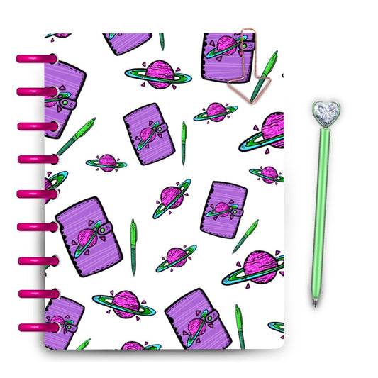 Purple planets and planners drawn on a laminated planner cover bright and vibrant cute doodles