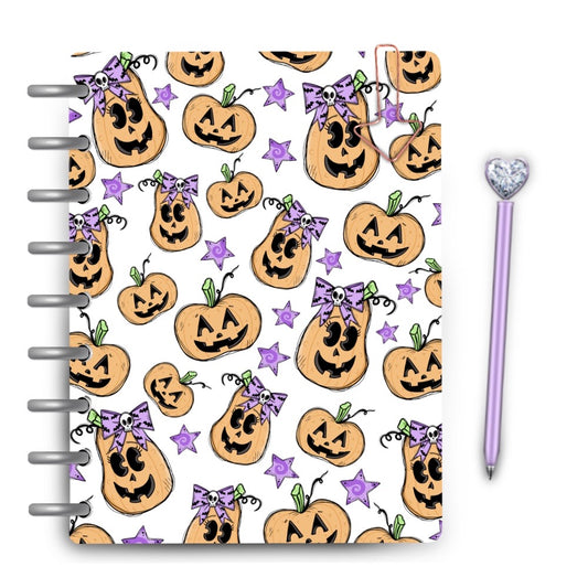 Cute halloween pumpkin pastel pattern with purple stars on laminated planner cover magpiesoul